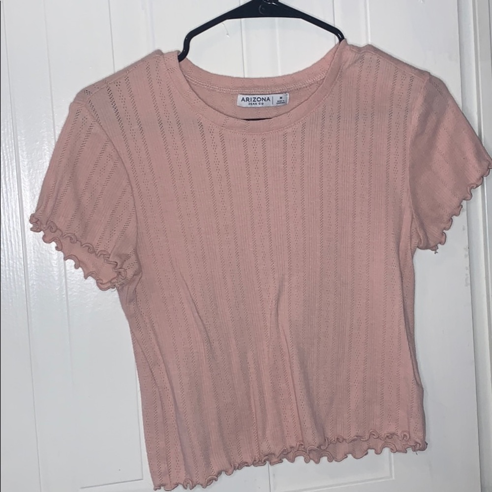 light pink ruffled shirt